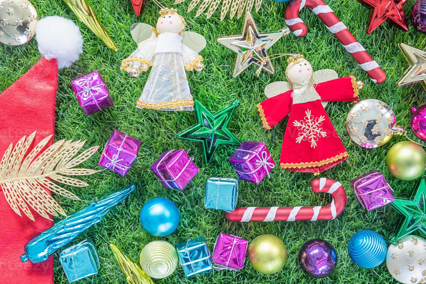 Top view Christmas decoration on green grass photo