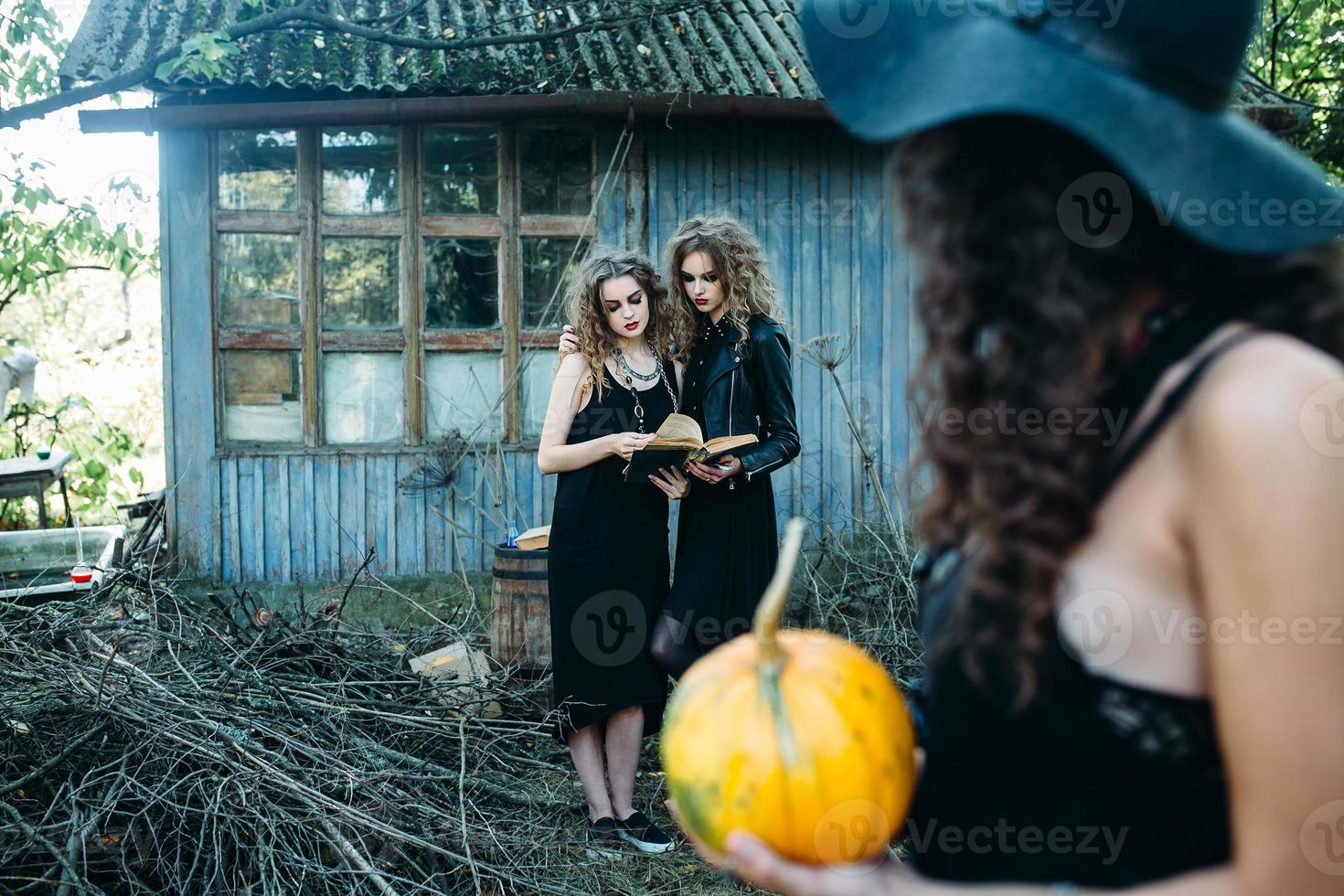 three vintage women as witches photo