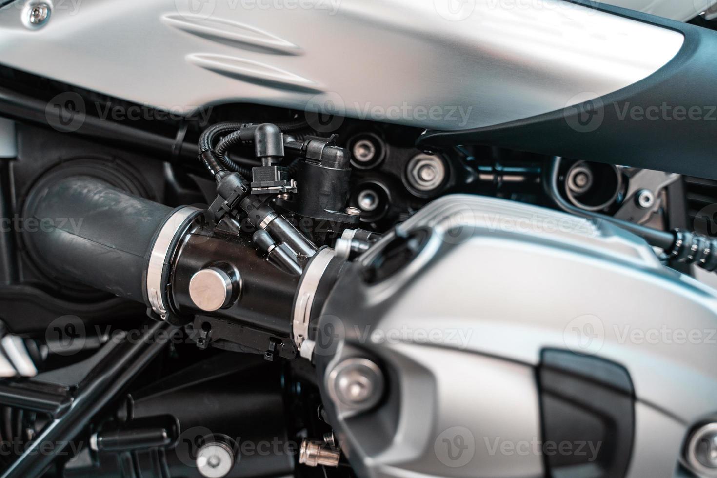 Cropped image of new motorcycle in shop. photo