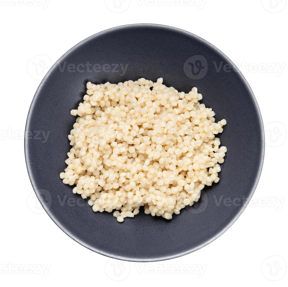 top view of boiled israeli pearl couscous in bowl photo