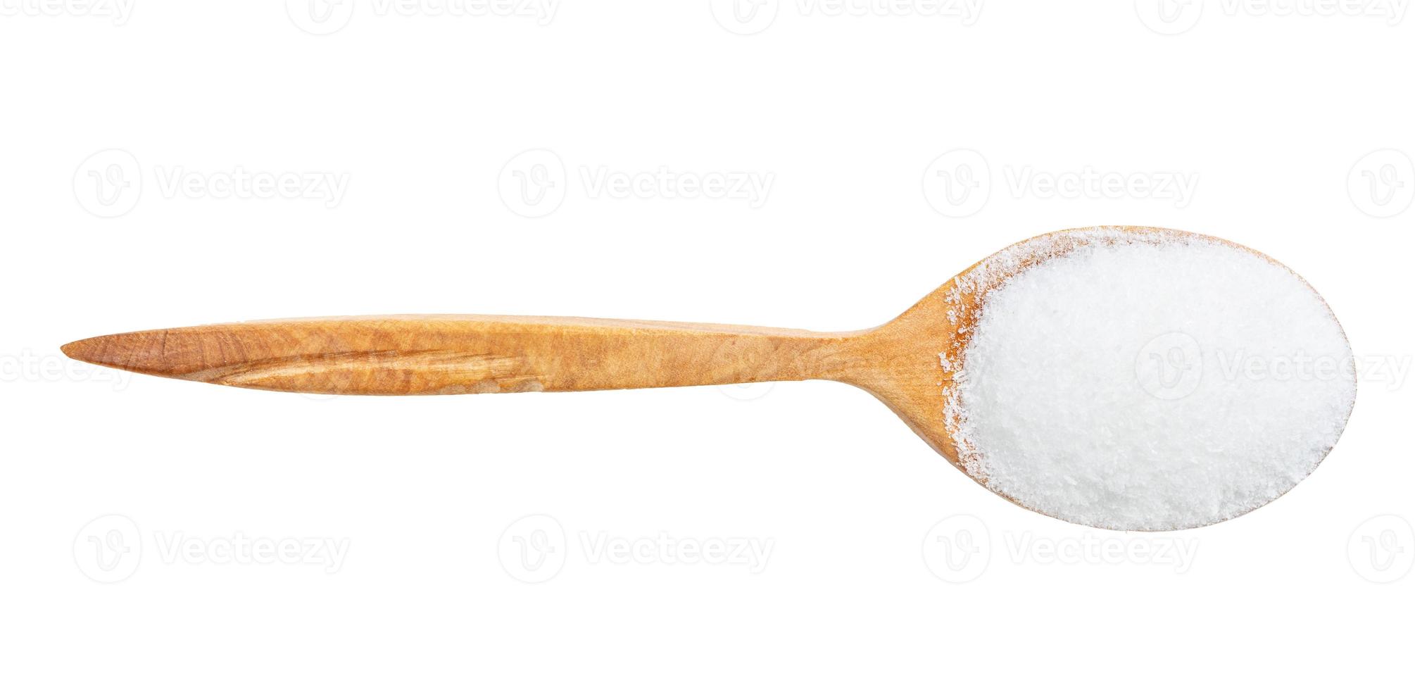 top view of wood spoon with glutamate flavoring photo