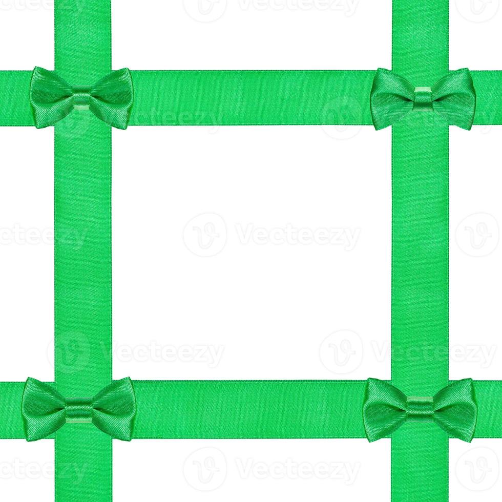 four little green bow knots on four satin strips photo