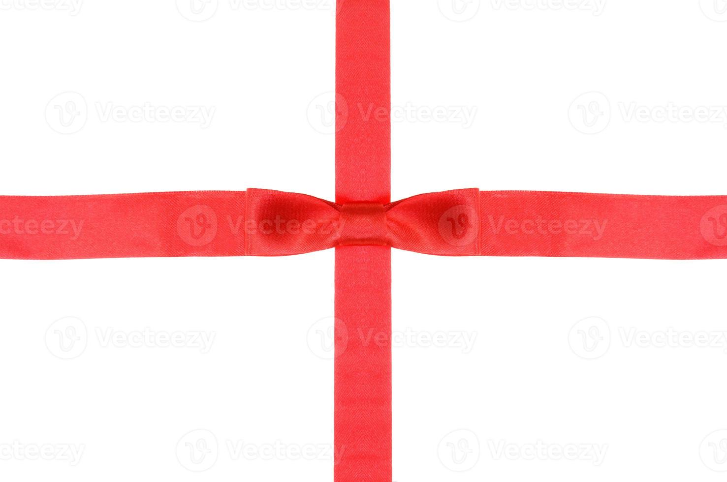 intersection of red ribbon and red band with bow photo