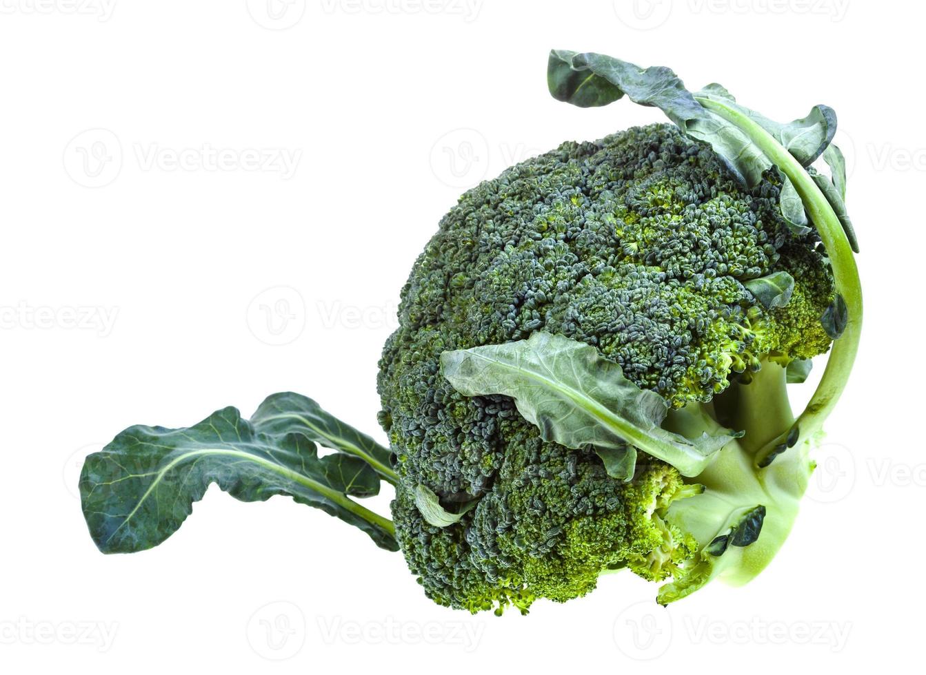 fresh green Broccoli with leaves isolated on white photo