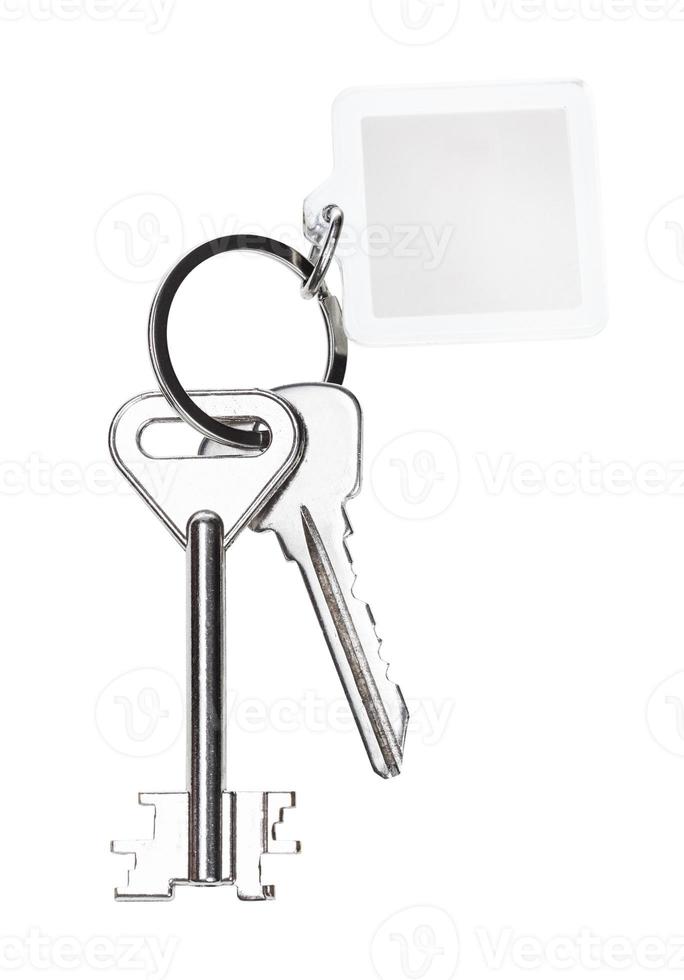 pair of keys on ring with blank keychain isolated photo