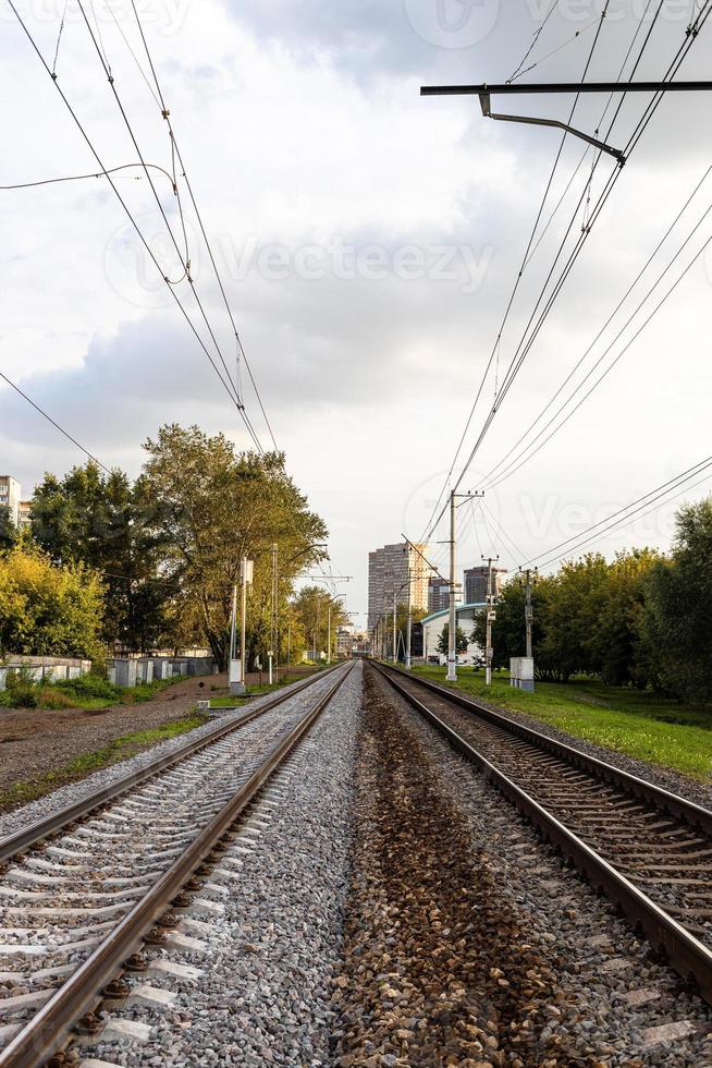 two railways in M city on cloudy day photo