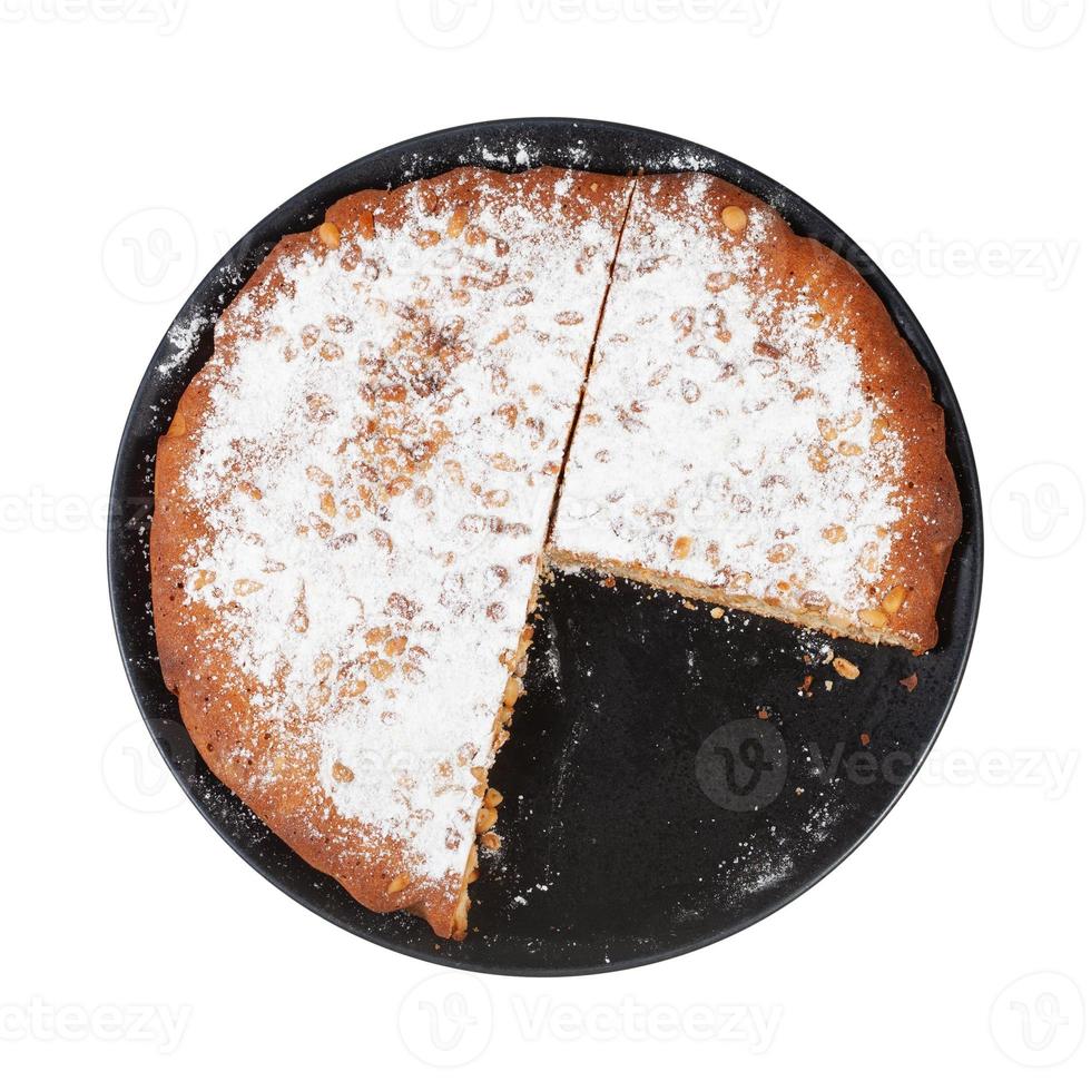 top view of sliced Italian Pine Nut Cake on plate photo