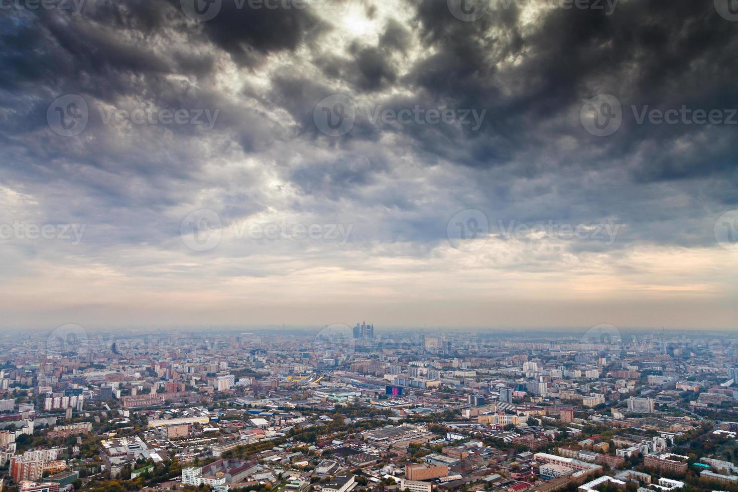 skyline with dark grey autumn clouds photo