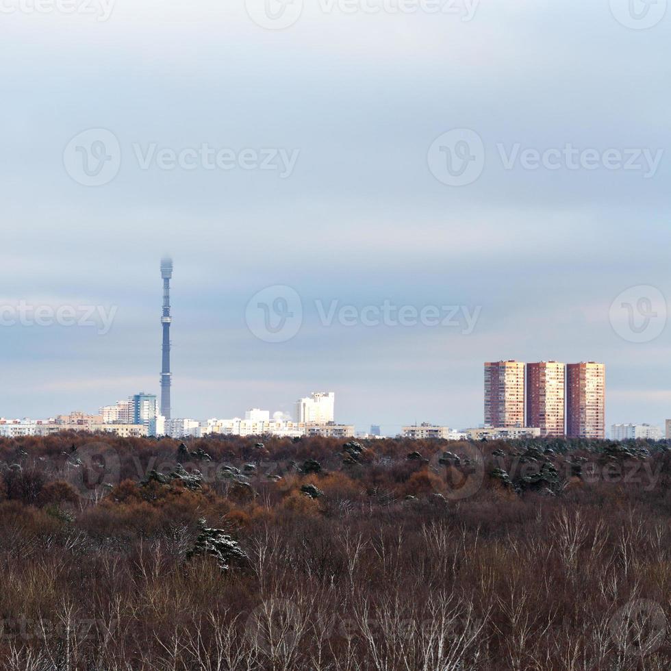 grey blue low winter clouds over city photo