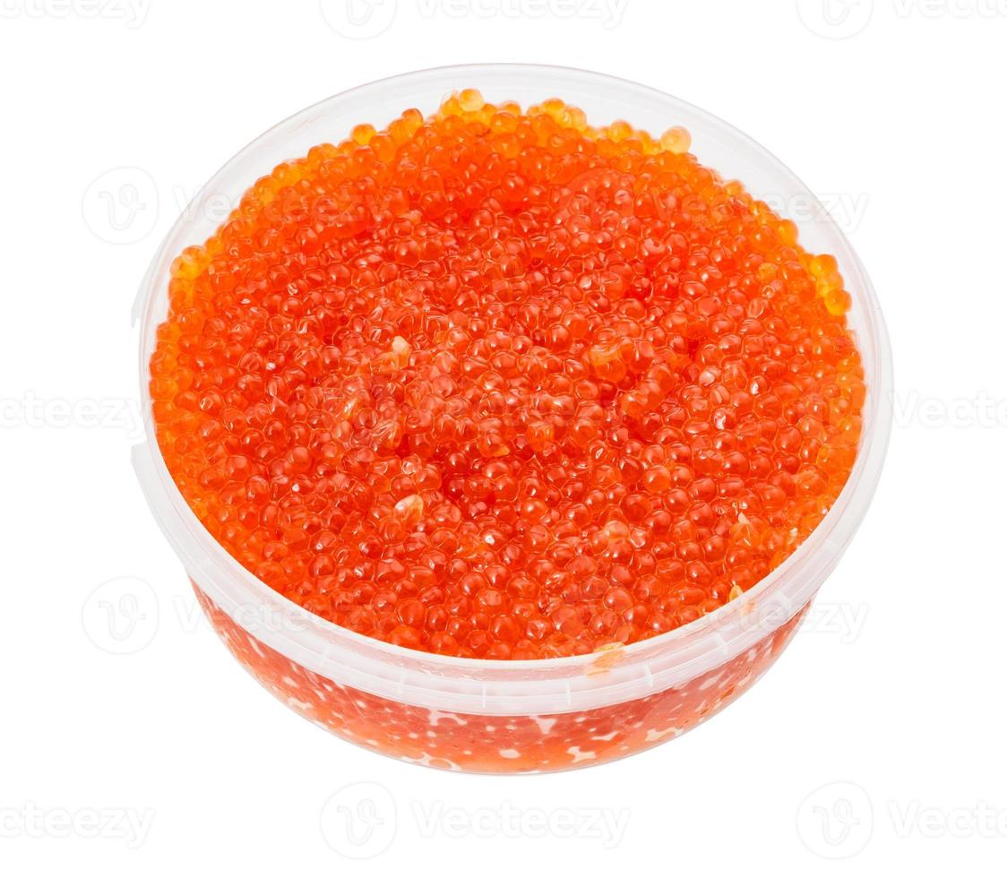 plastic container with salted russian red caviar photo