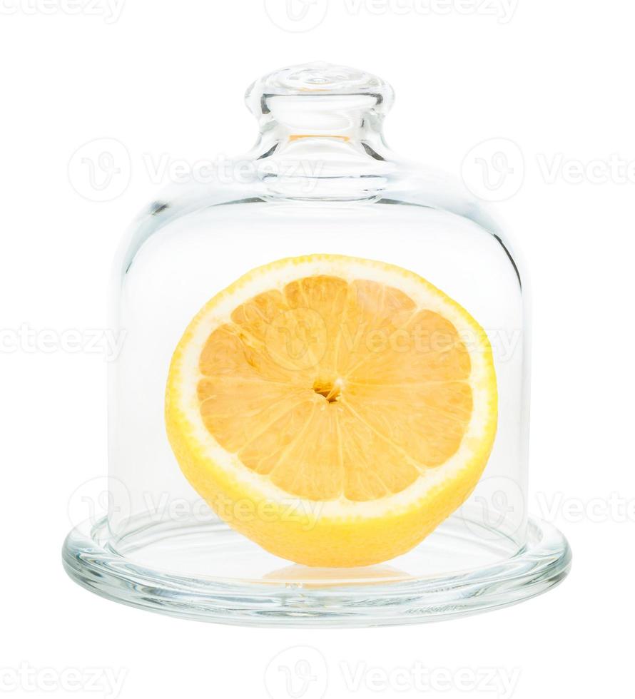 halved fresh lemon in Glass Lemon Keeper isolated photo