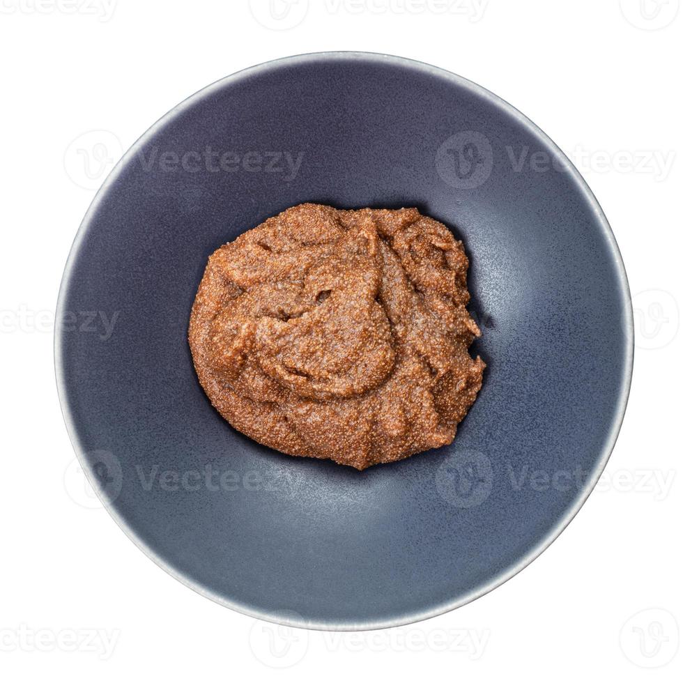 top view of porridge from teff grains in gray bowl photo