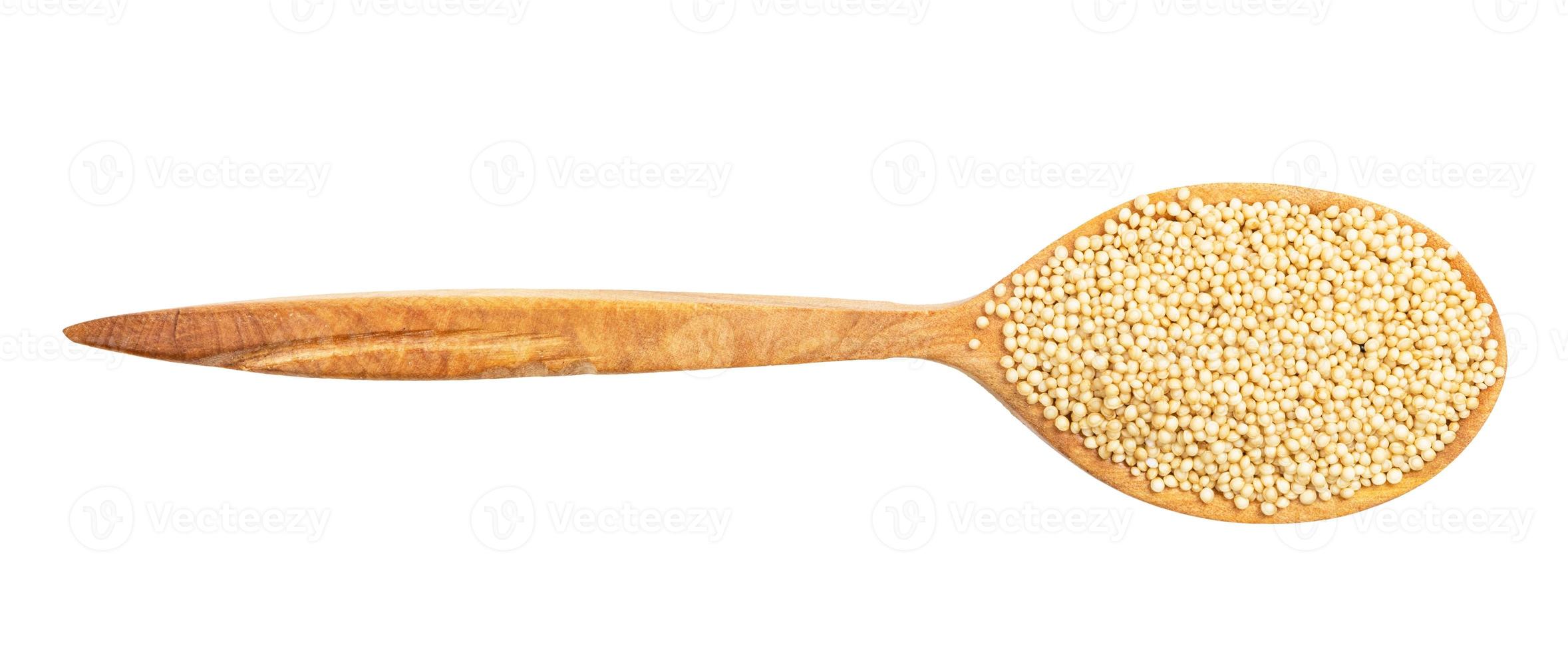 top view of wood spoon with amaranth grains photo