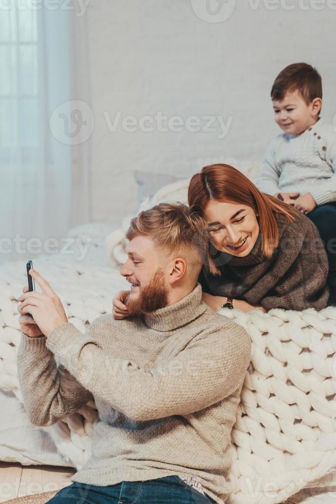 Mom, Dad and Little Son Spends Time Together photo