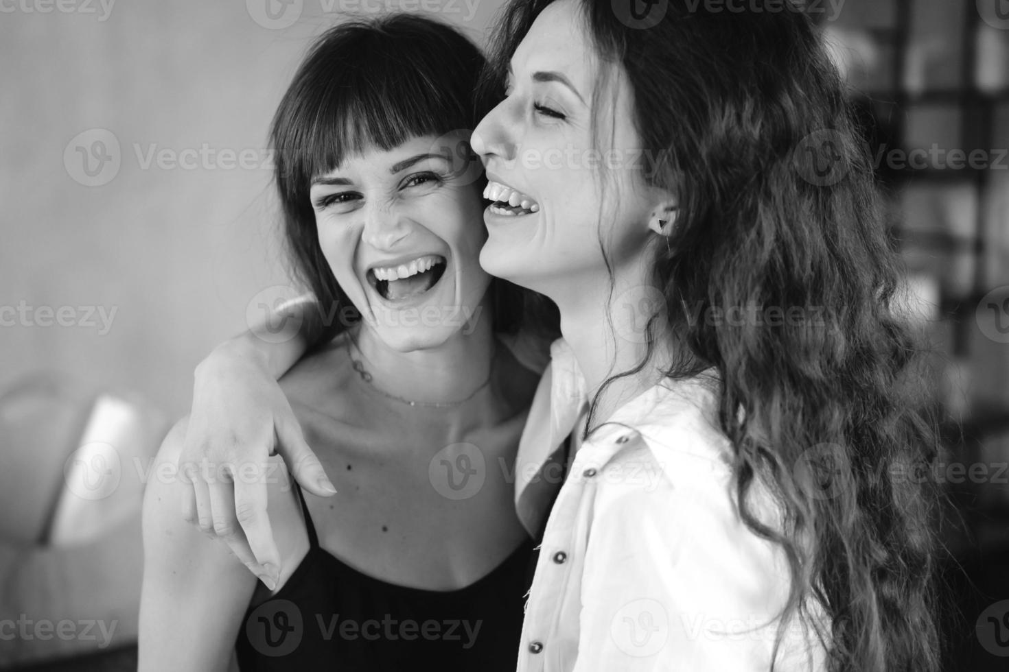 Two girls in each other's tender embraces photo