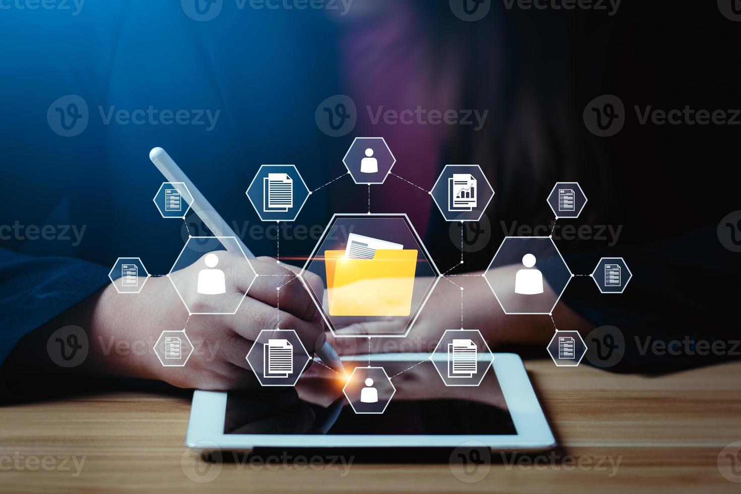 Document management system concept Businessman working on digital tablet document management system DMS, virtual online document database. and process automation to manage files efficiently photo
