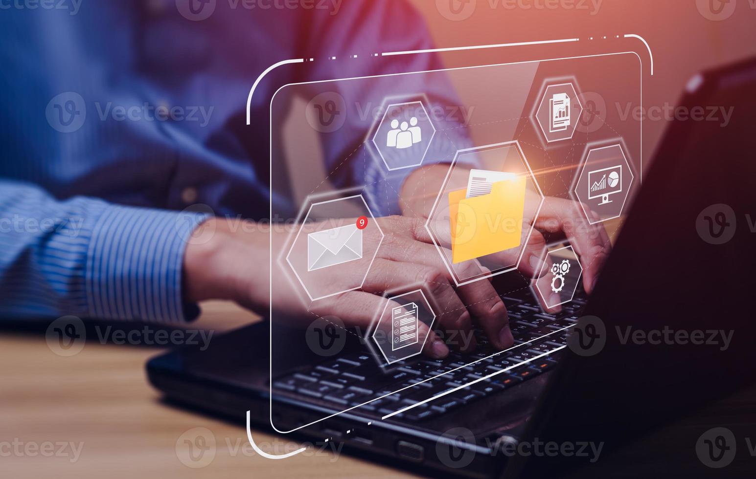 Document Management System DMS, Online document file data software for efficient archiving and company data. IT installs software to find and manage data files on notebook computers. photo