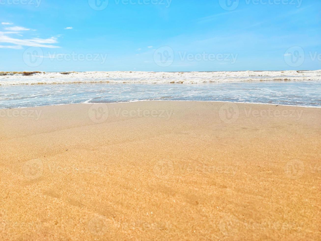 Defocus blurred image of nature landscape view of beautiful tropical beach and sea in sunny day. Beach sea space area. Sea beach with blue sky. photo