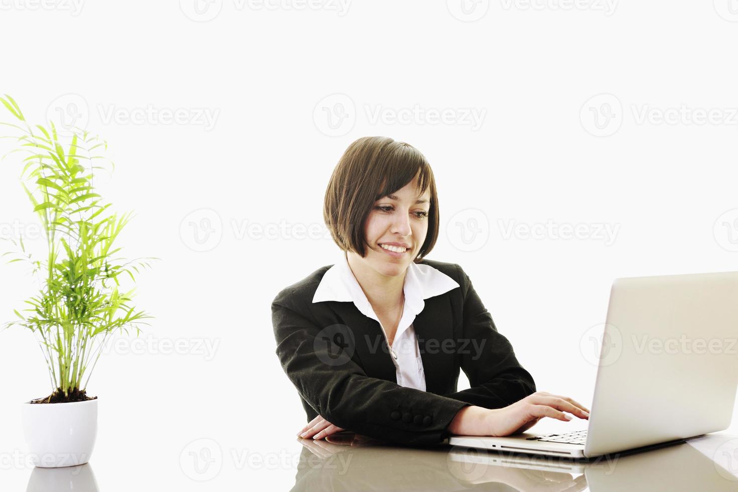 business woman working on laptop photo