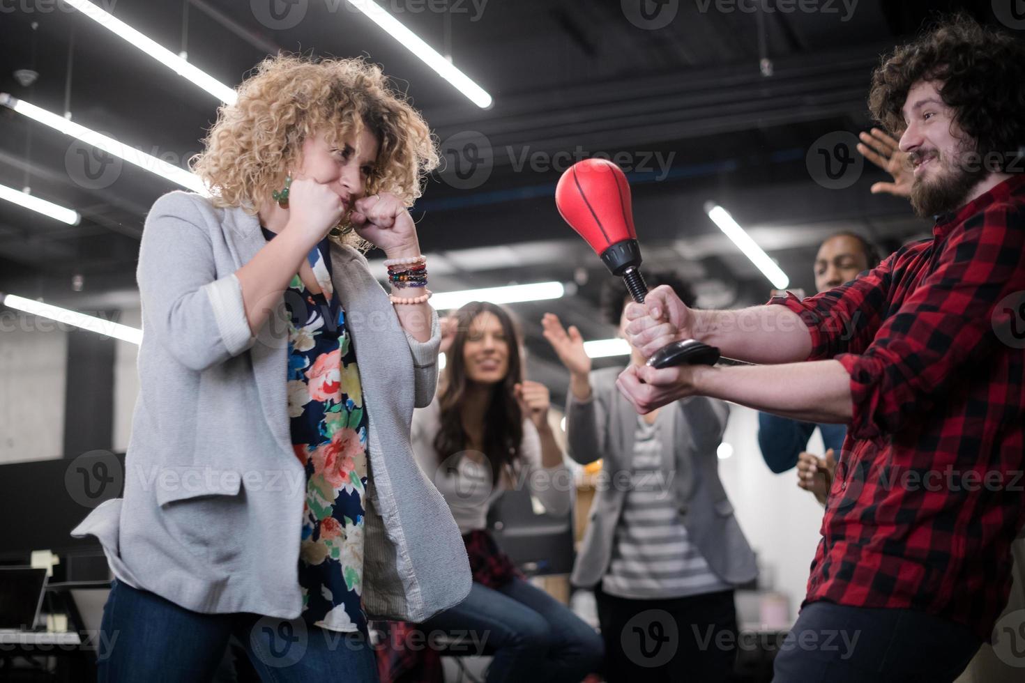 multiethnics business team boxing at office photo