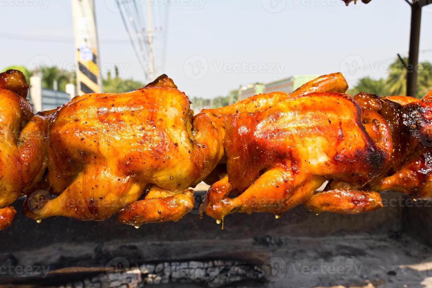 Chicken roasted on the spit photo