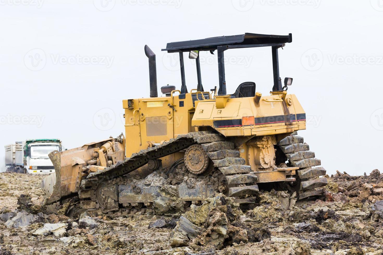 Bulldozer in construction site photo