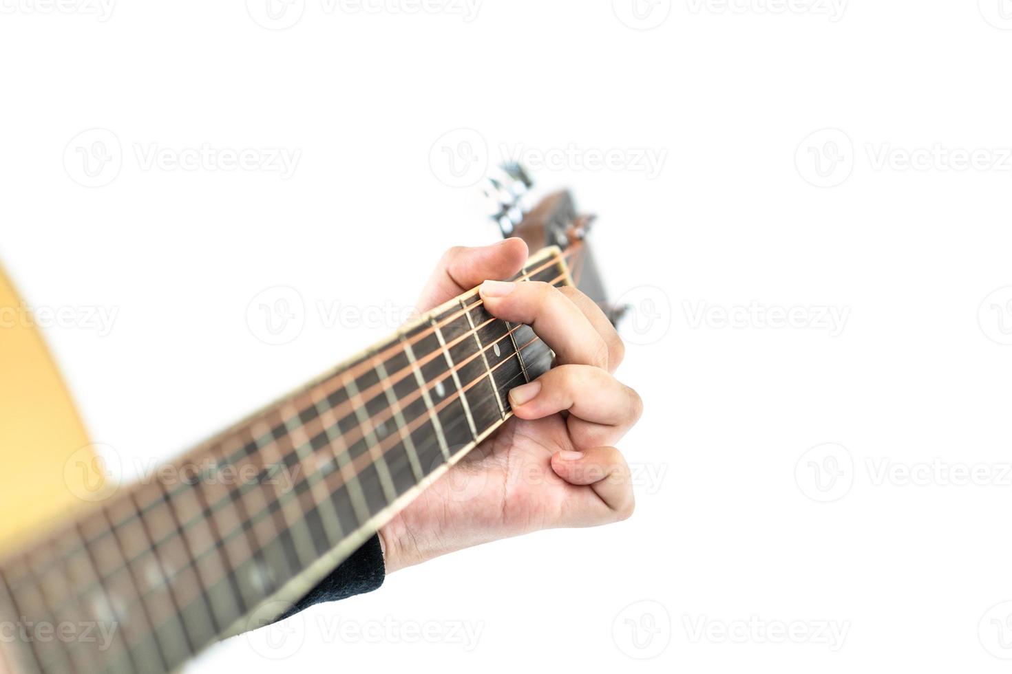 Hands playing guitar on white photo