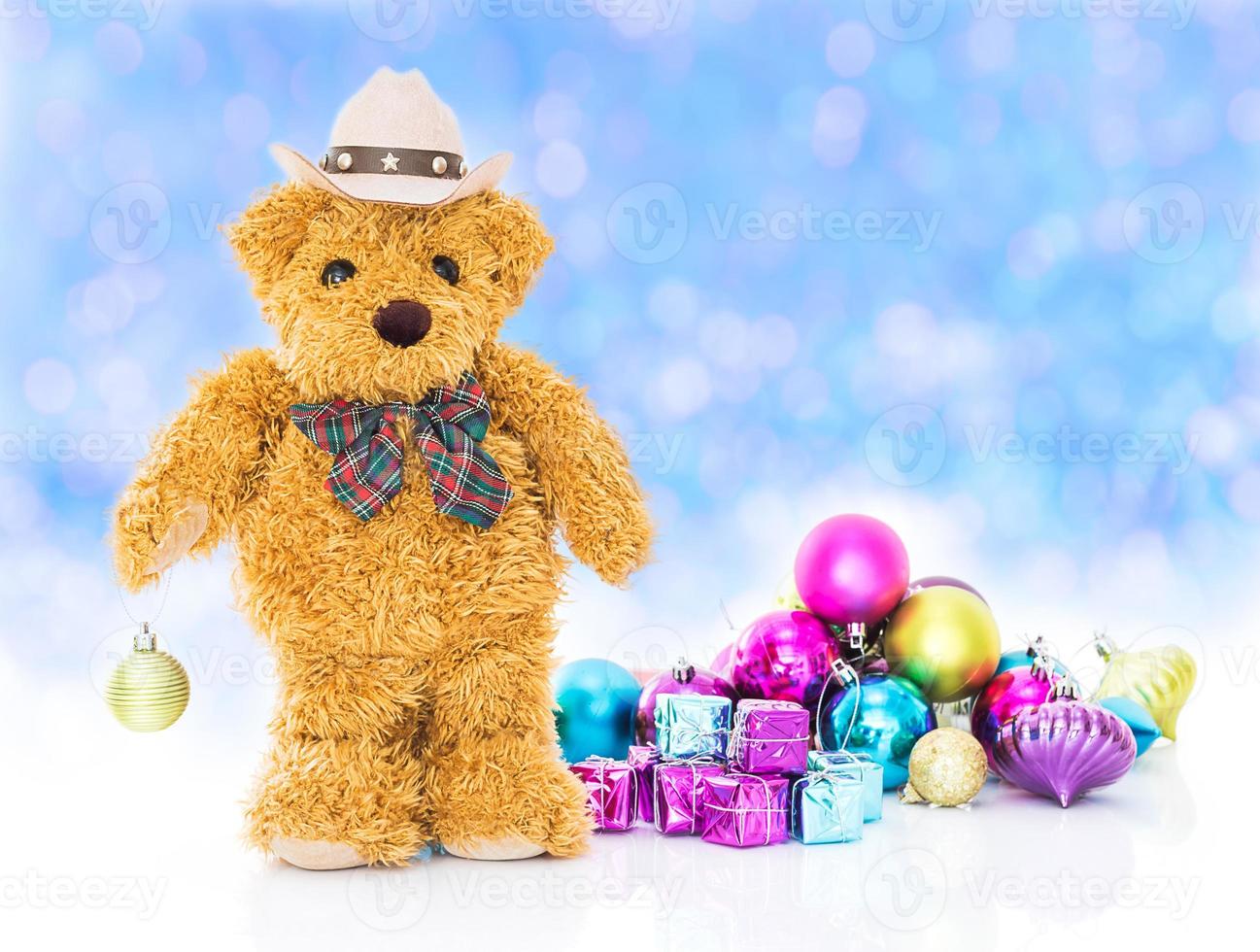 Teddy bear with gifts and ornaments new year photo