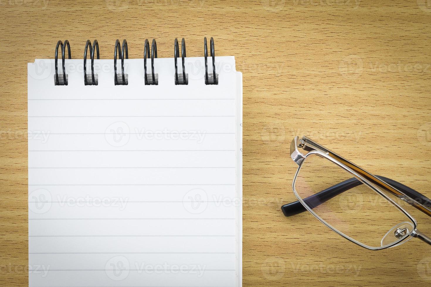 Notepad with blank page photo