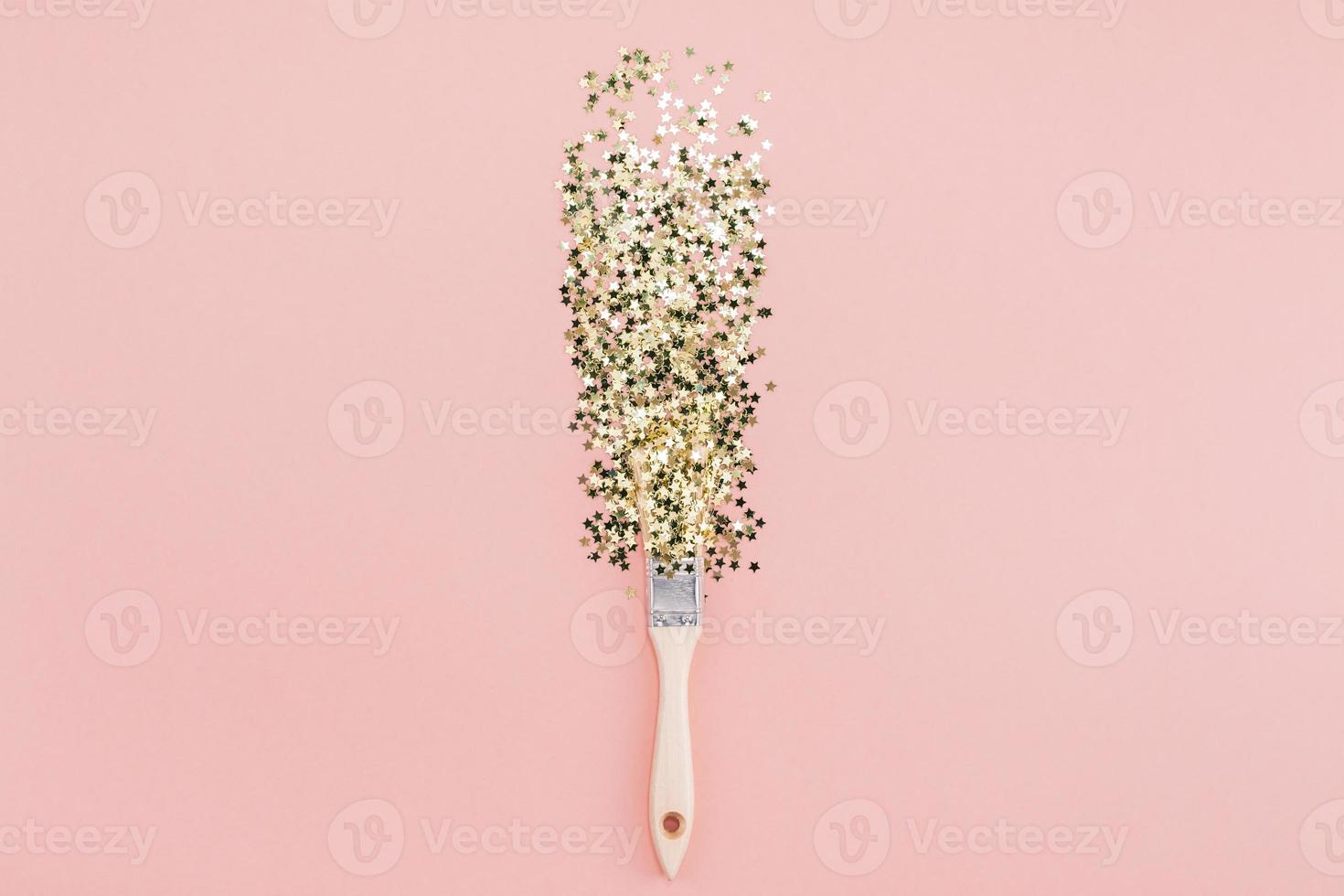 Surreal Paint brush drawing golden stars confetti photo