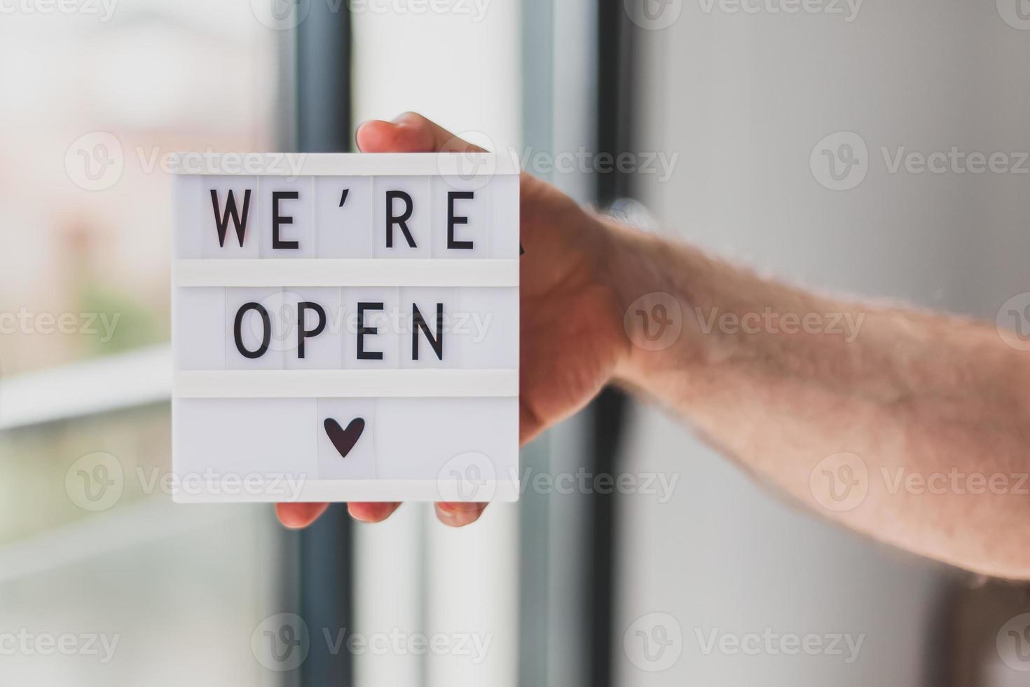 End of quarantine. Greeting message We're open photo