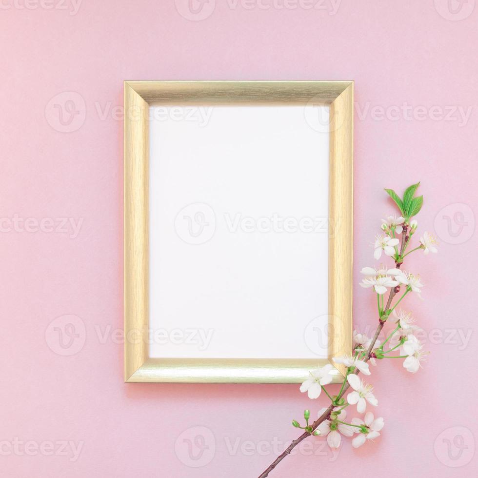 Blank frame mockup with white flowers photo