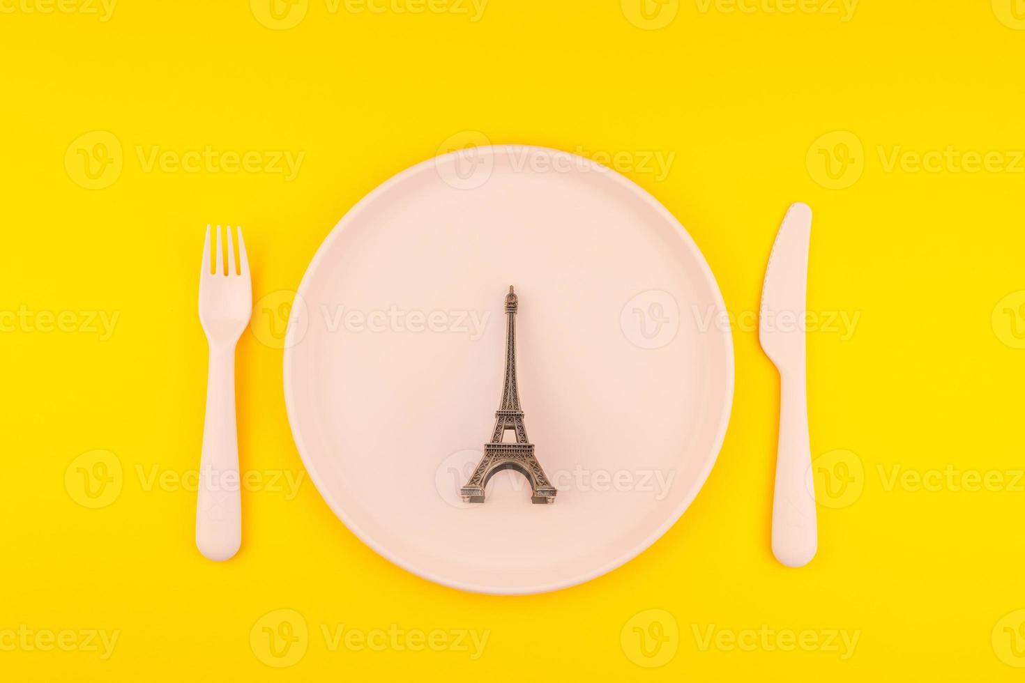 Small Eiffel tower on serving table photo