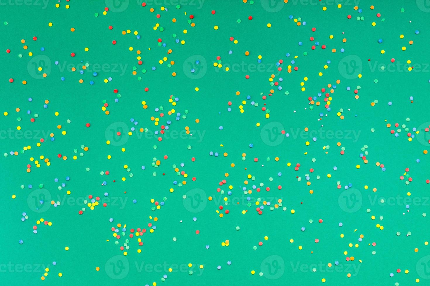 Christmas pattern green paper colorful confetti photo