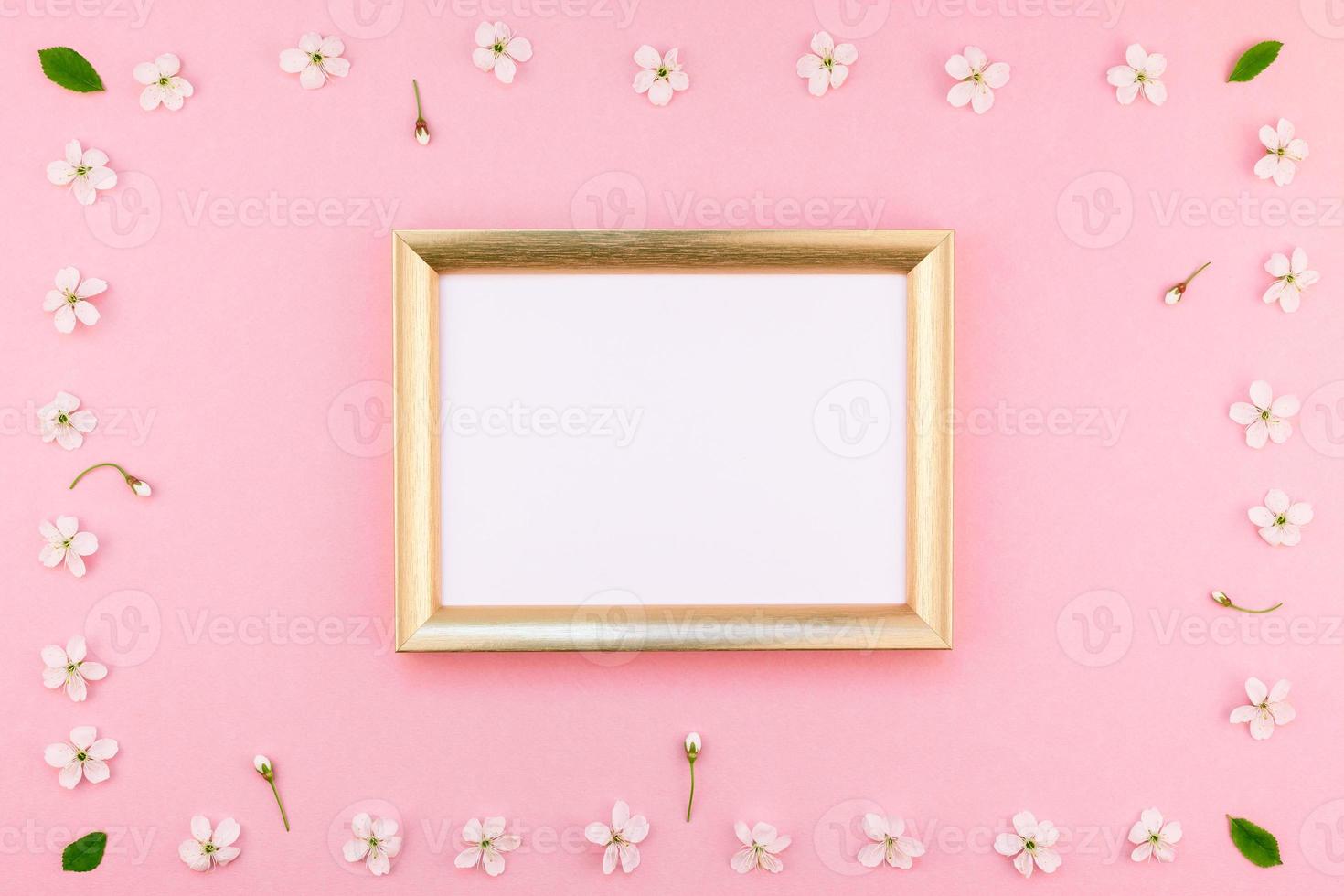 Blank frame mockup with white flowers photo