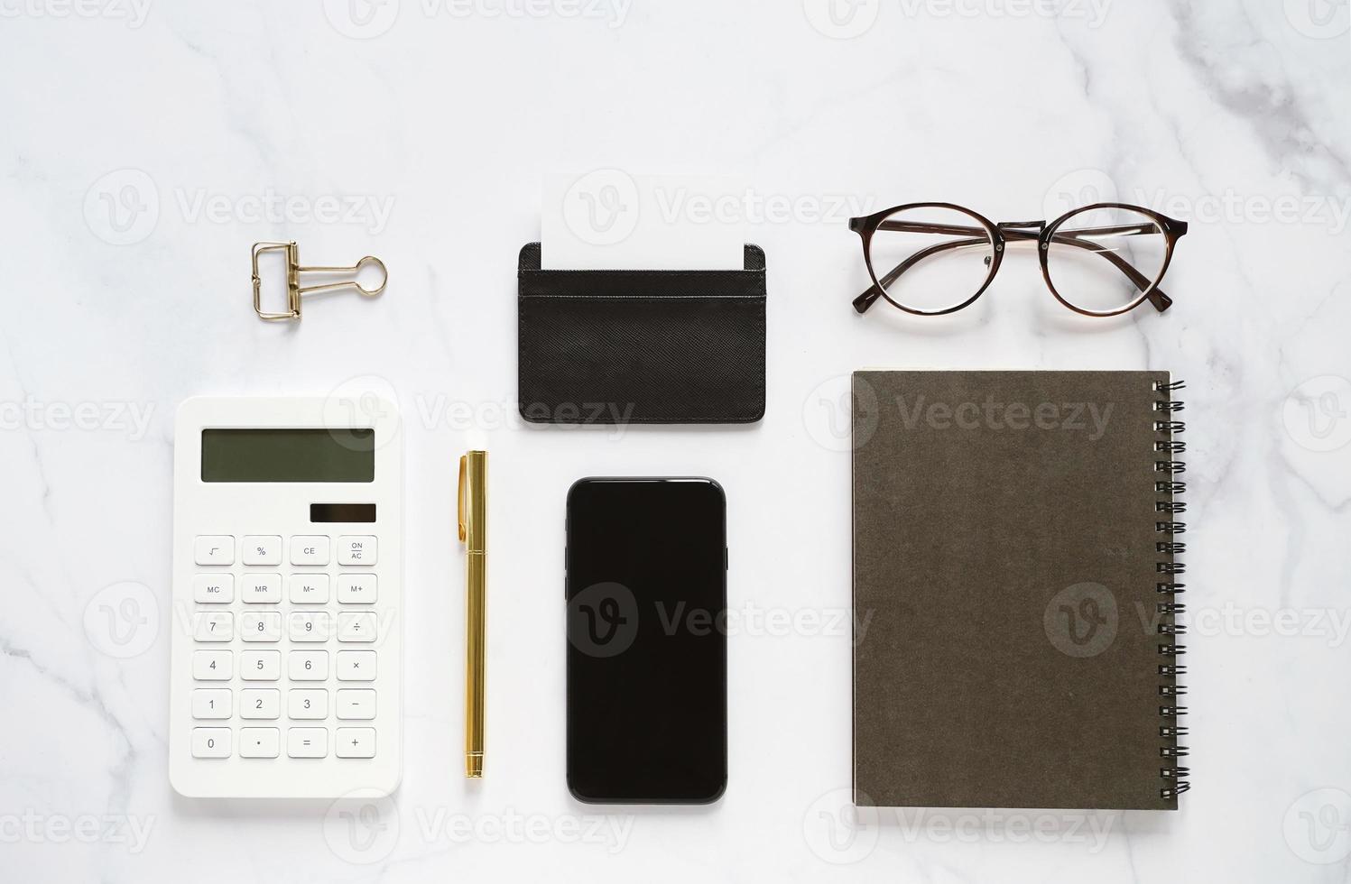 Flat lay of business branding mock up of workspace desk on white marble background, minimal template design photo