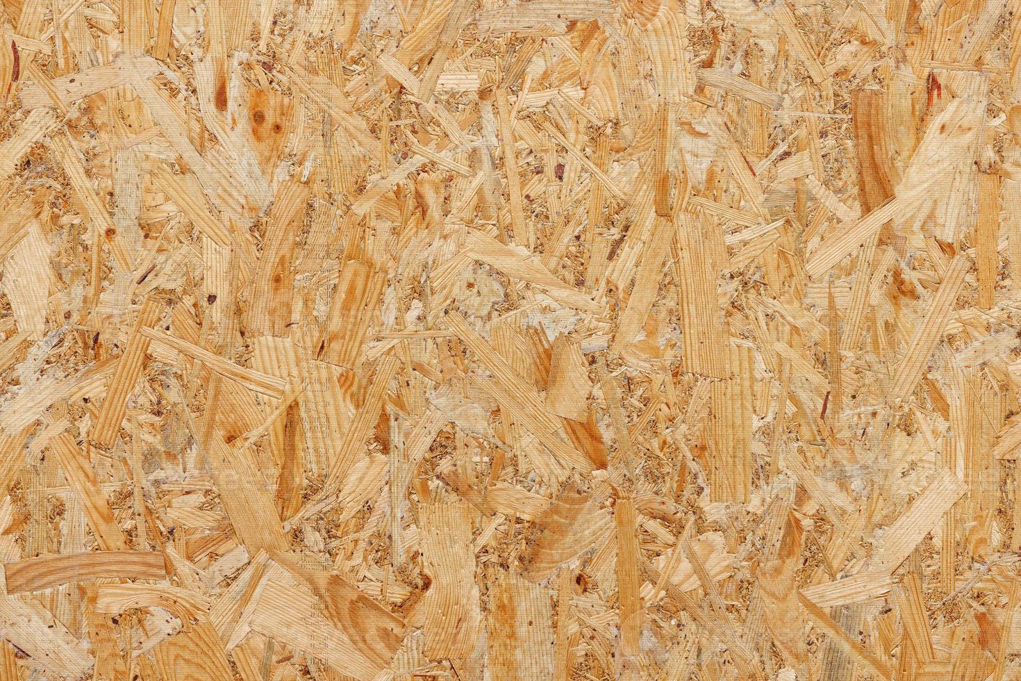 Seamless texture of oriented strand board OSB wood plank for background. photo