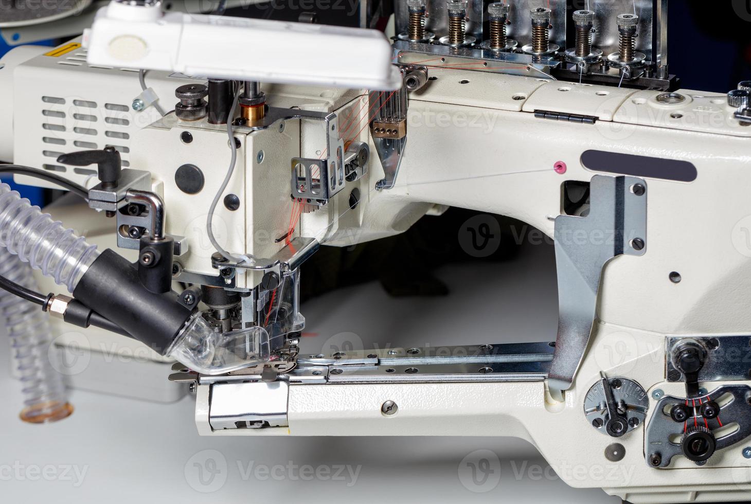 Professional sewing machine with dust extraction close-up. photo