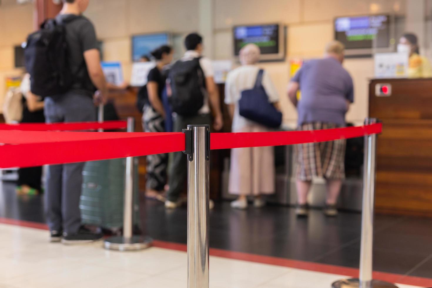 Selected focus on security post with passenger check in at the airport. photo