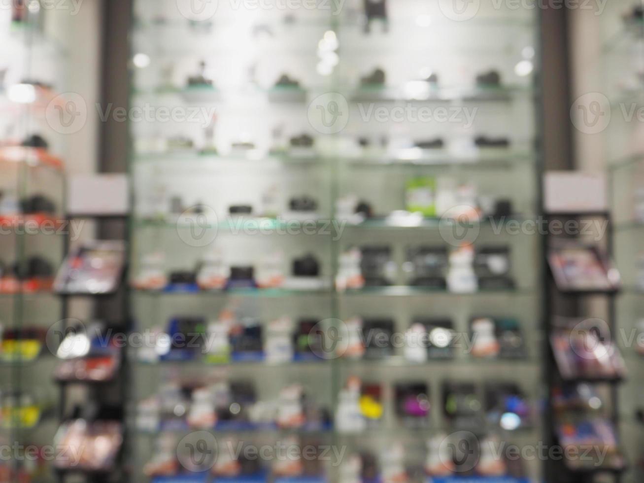 Blur camera store shelves background photo