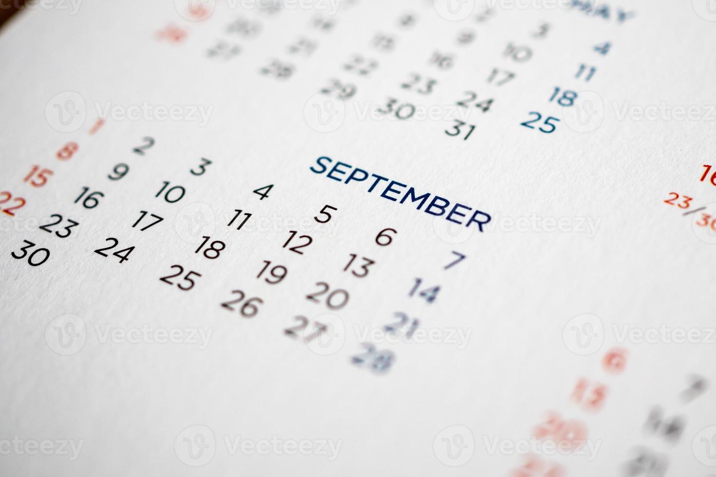 September calendar page with months and dates photo