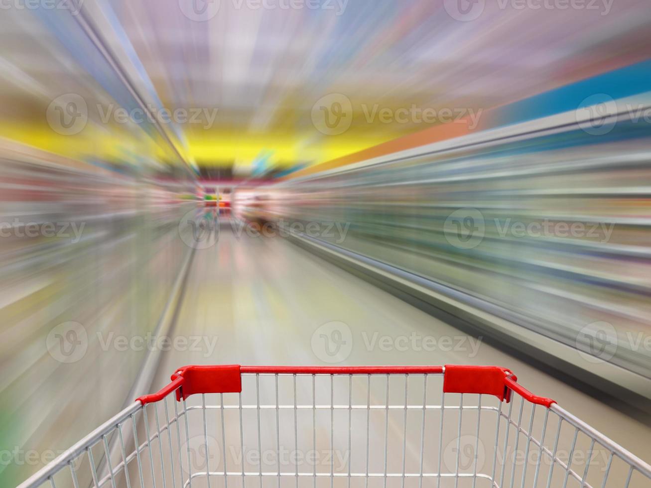 Aisle Milk Yogurt Frozen Food Freezer and Shelves in supermarket photo