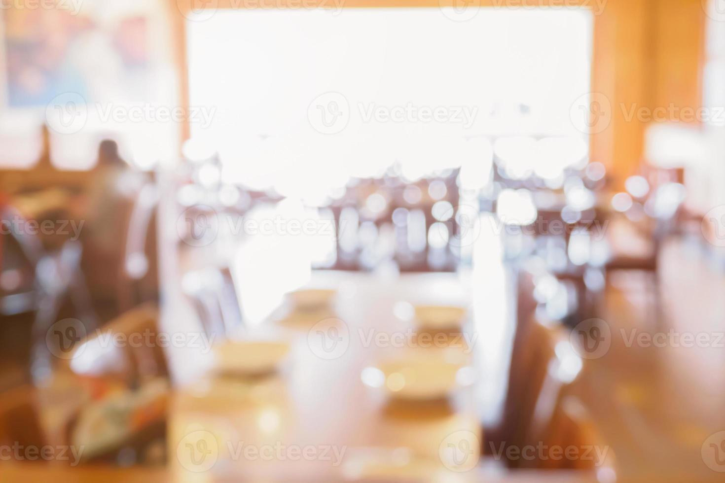 restaurant table blur defocused background with bokeh light photo