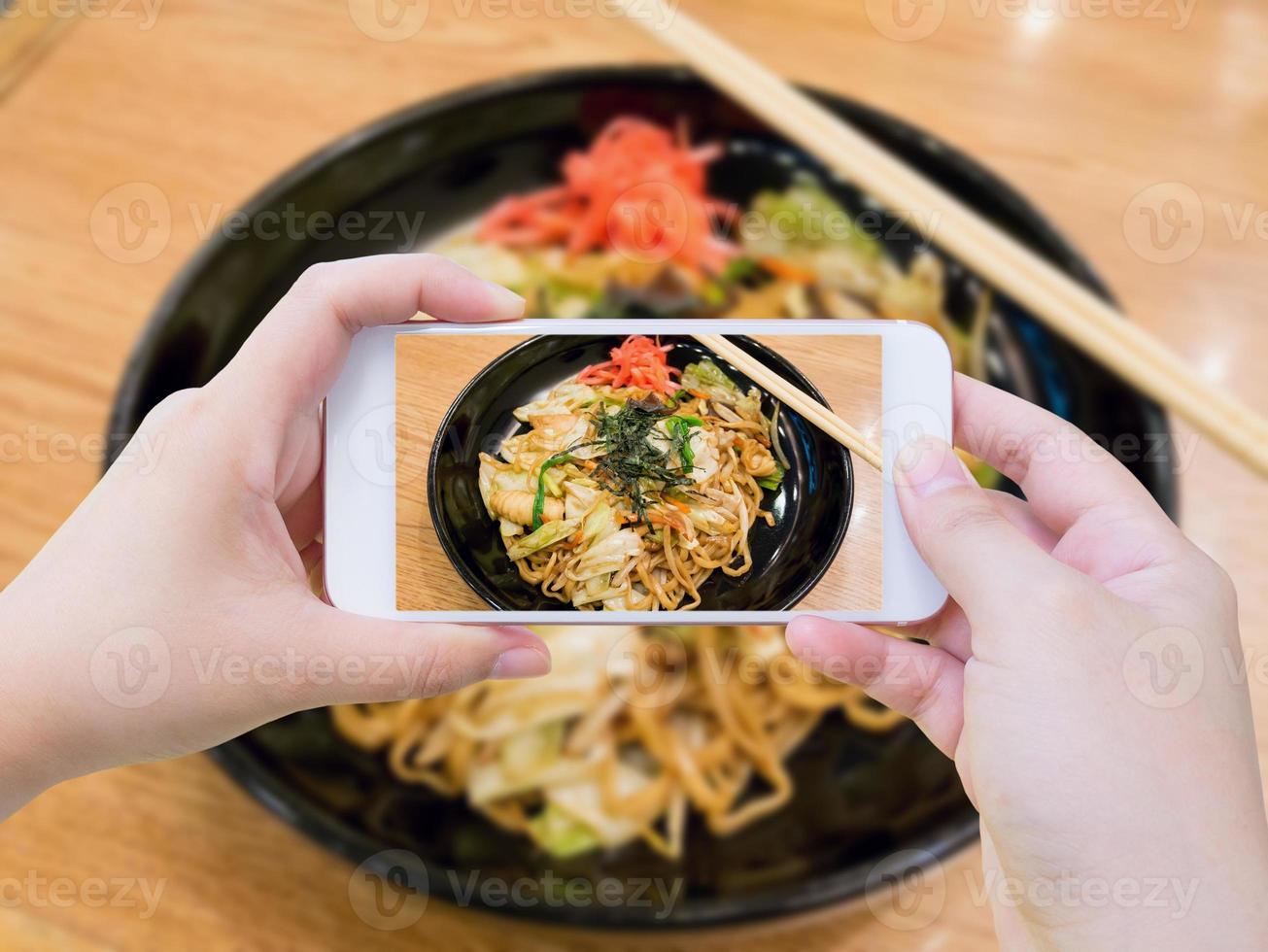 Taking photo of Yakisoba, japanese fried noodle