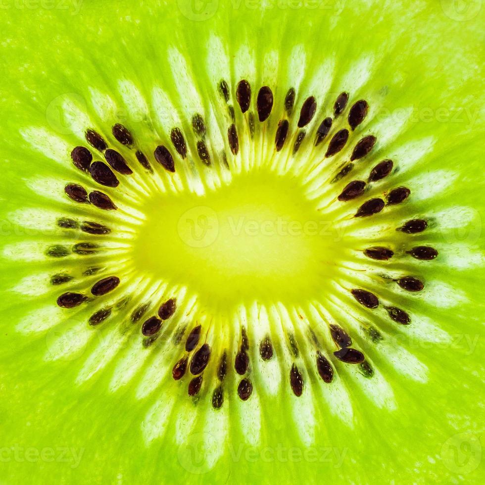 Fresh kiwi fruit slices closeup macro texture background photo