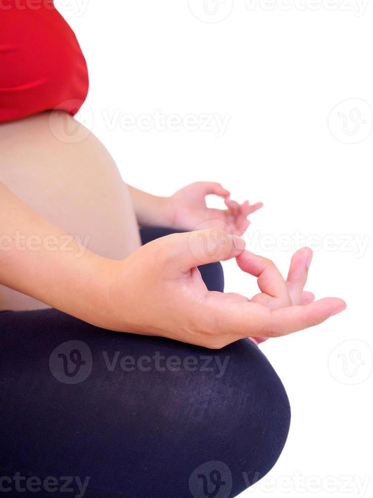 pregnant woman doing yoga photo