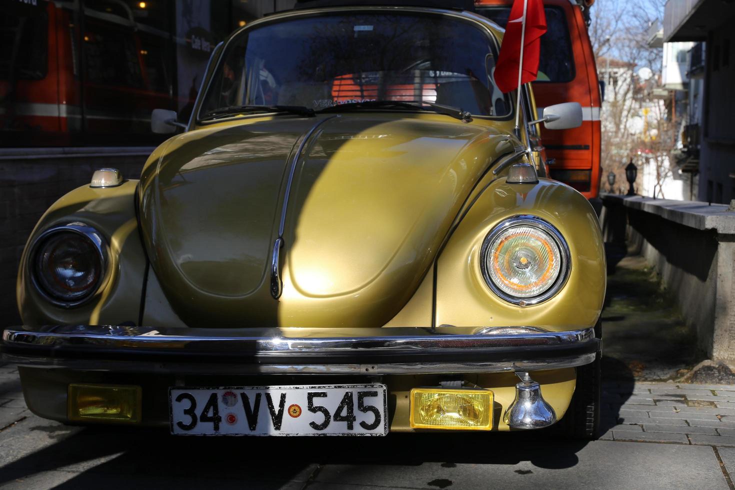volkswagen classic car rear right cross view yellow gold photo