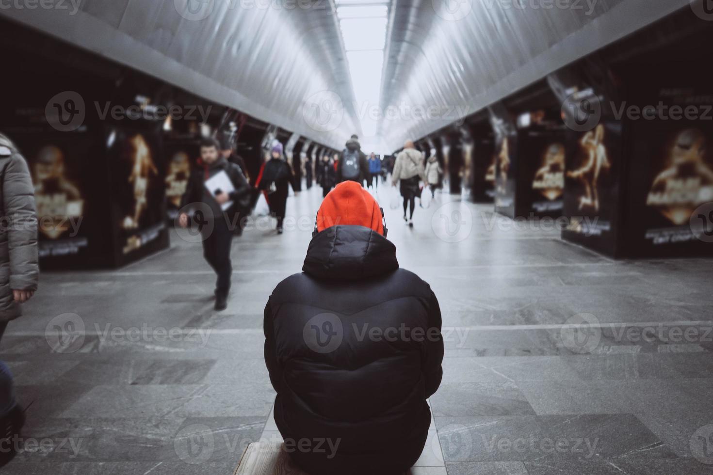 Man from the back in the subway. People in metro photo