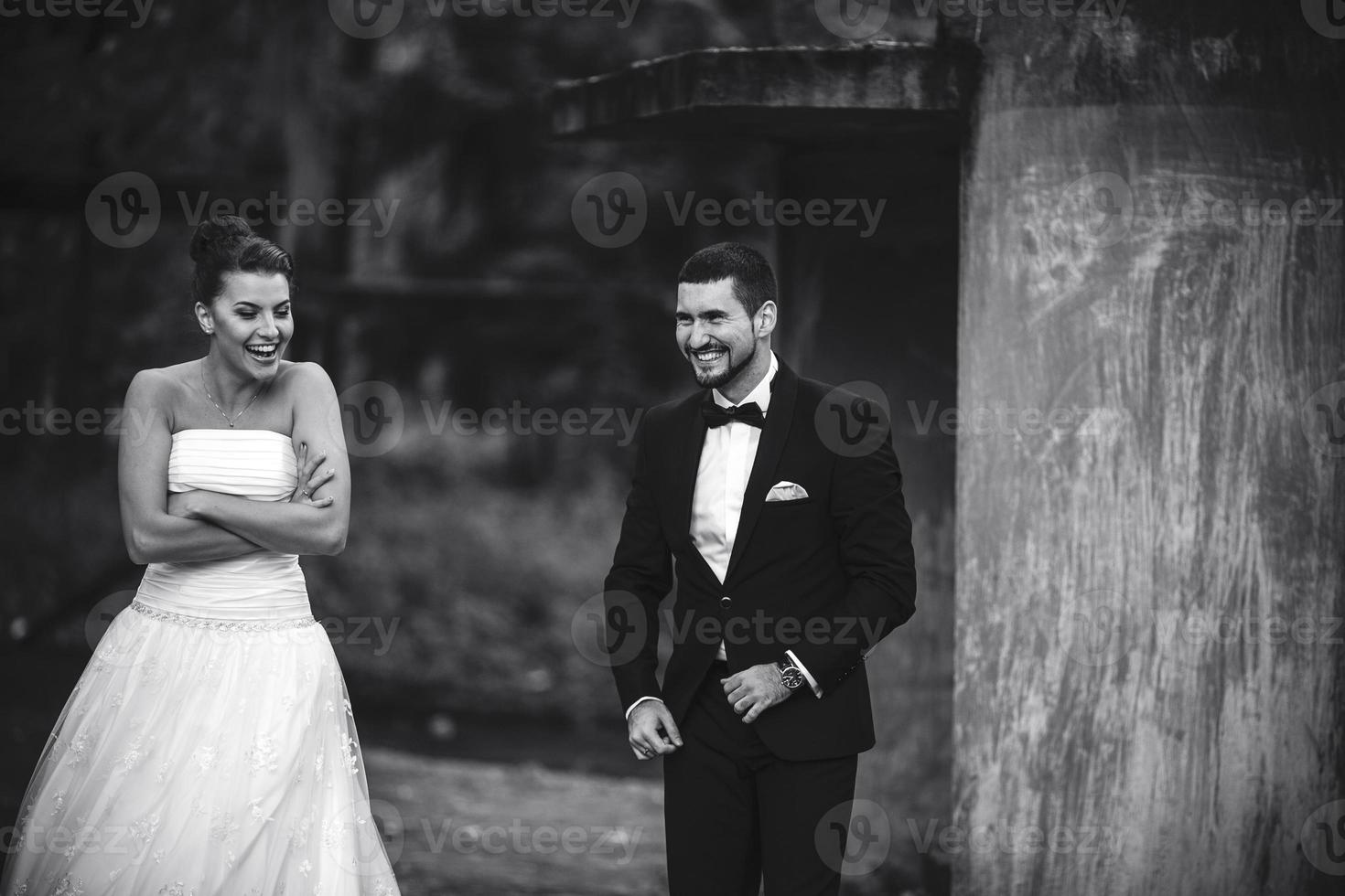 bride and groom having fun photo