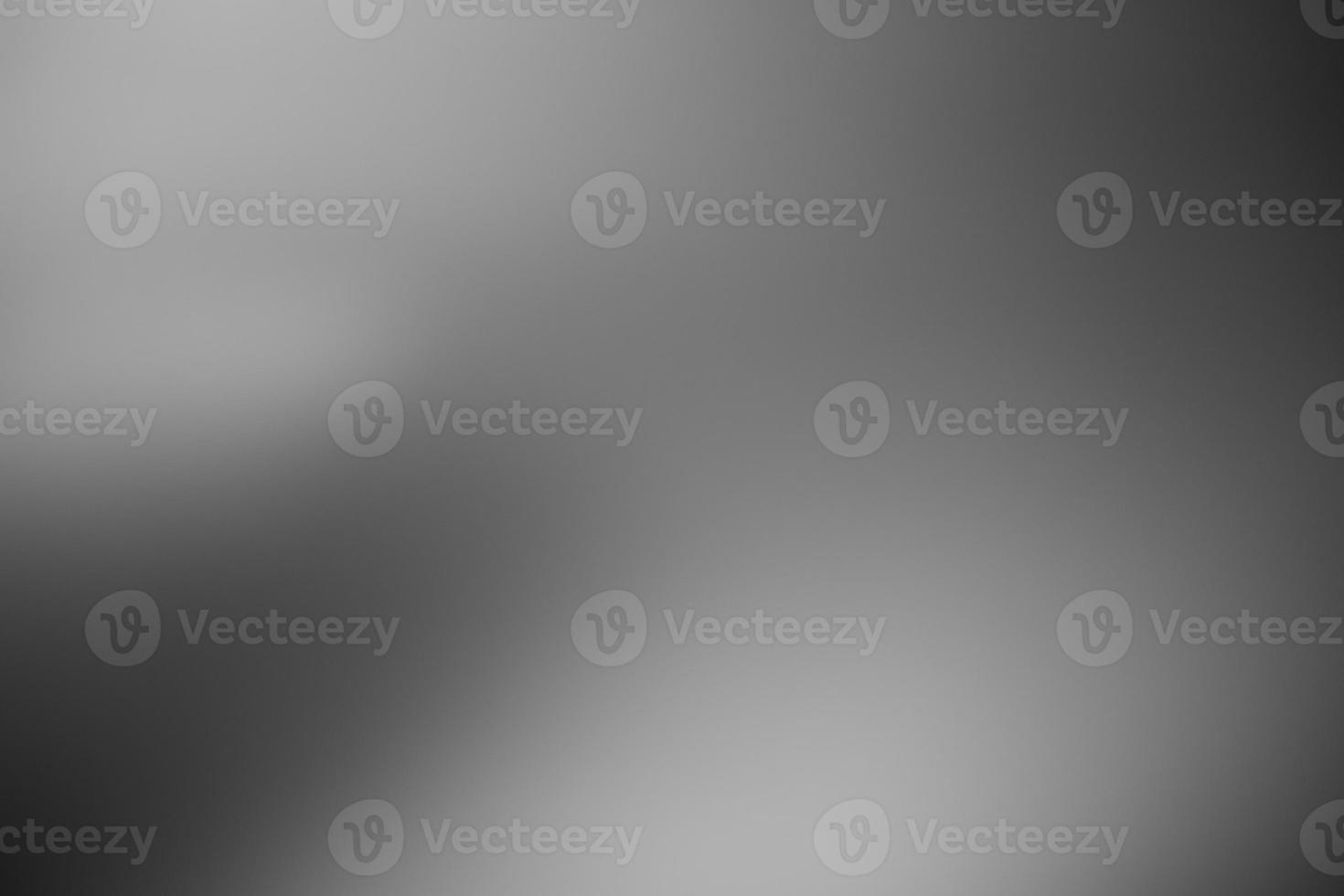 Dark black and gray blurred background has a little abstract light. soft background for wallpaper,design,graphic and presentation photo